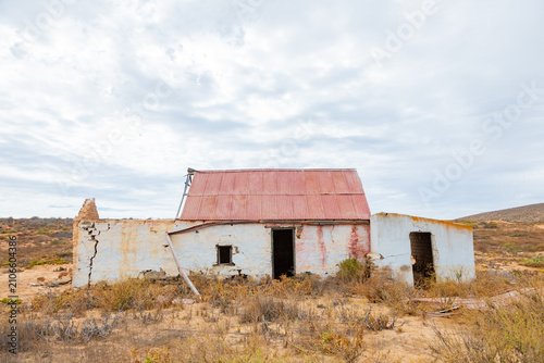 Abandoned, derelict old colonial farmstead in arid region