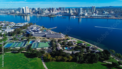 Photos Hospitality structures featuring rooftop solar arrays sit adjacent to private docks along harbor edge
