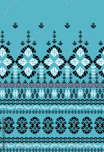 Ethnic geometric seamless border pattern with bohemian tribal ornaments on turquoise background.