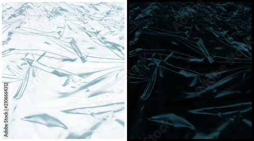 Crumpled plastic texture background, abstract wrinkled foil surface in light and dark blue tones, metallic creased film material for industrial design
