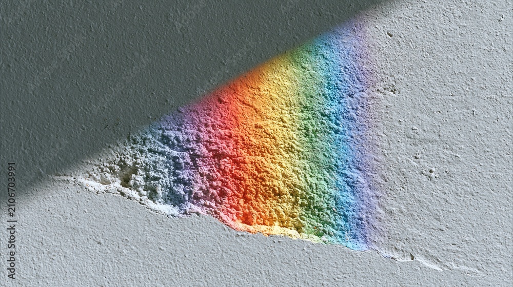 Obraz premium Vibrant rainbow powder explosion on concrete surface, showcasing colorful abstract art and dynamic visual effects for creative projects