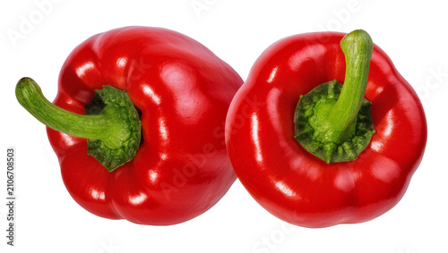 Isolated two vibrant red bell peppers, fresh and ripe, healthy organic vegetable ingredients