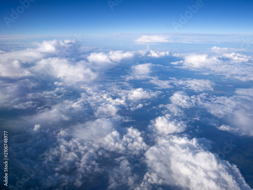 View above the clouds. Cloudy sky background.