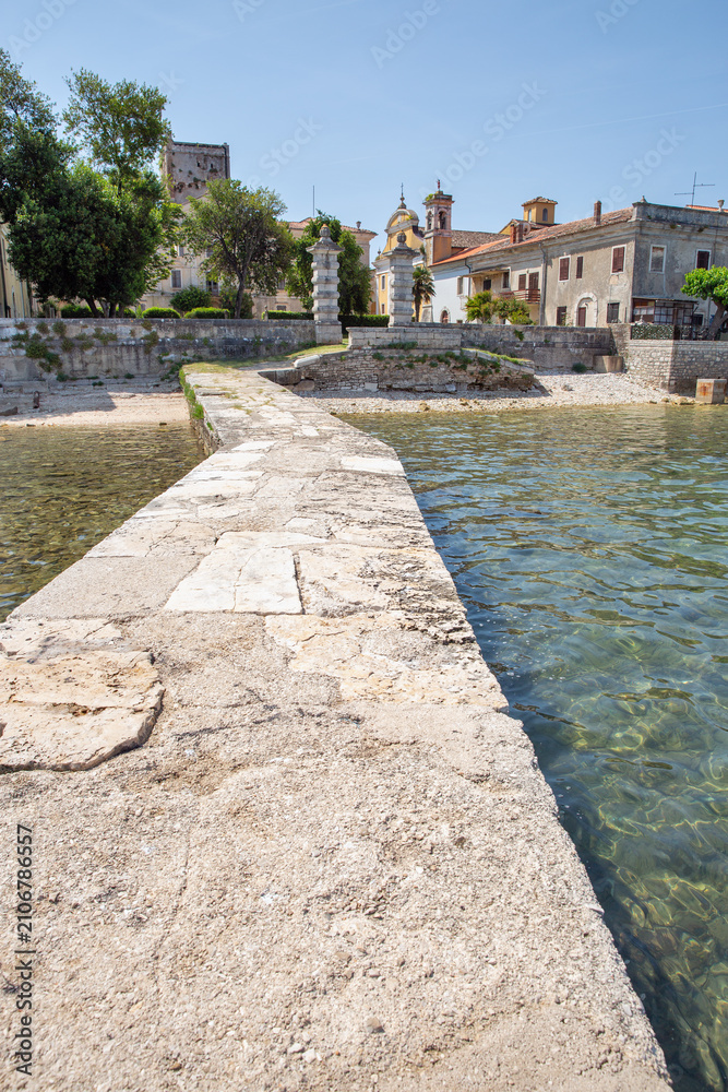 Fototapeta premium Stone pier leading to Dajla monastery in Istria, Croatia.