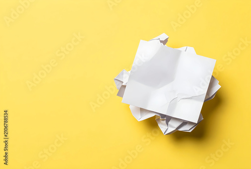 Crumpled white paper sheets...
