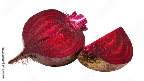 Obraz na plátně Isolated fresh organic beetroot cut in half with a separate wedge, displaying vi
