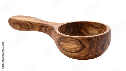 Isolated rustic handmade wood scoop, elegant carved kitchen utensil, natural cooking tool.