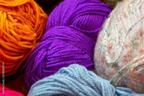 Schilderij op canvas Several skeins of acrylic yarn for crocheting and knitting