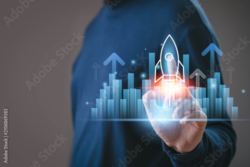 Startup business growth concept with rocket launch icon and rising financial graph, representing innovation, investment success, market expansion, profit growth, entrepreneurial business development.