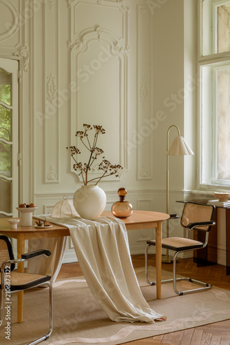 Canvastavla Elegant dining room interior with classic decor and modern furniture in a bright
