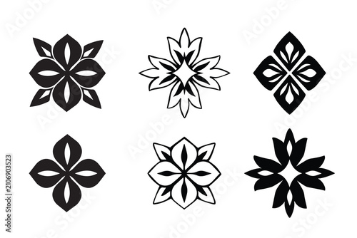 Hand drawn ornamental floral motifs in black color. Decorative silhouette style elements in vintage design. Isolated vector illustration.