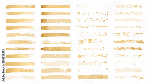 Quadro su tela Gold brush strokes pattern with varied texture on white background