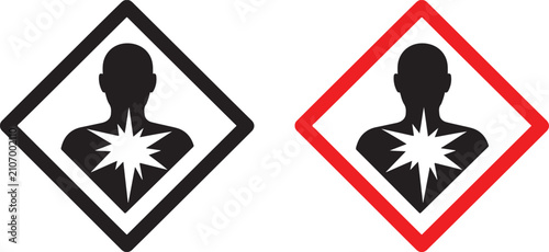 Bild auf Leinwand Two hazard symbols depicting a human silhouette with a starburst in the chest on