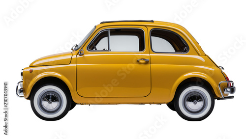 Принти на полотні Isolated vibrant yellow vintage compact city car, perfectly restored classic aut