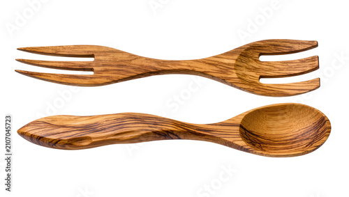 Isolated beautiful olive wood salad server set for kitchen and home cooking utensils.