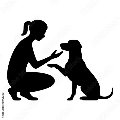 The concept of dog obedience training silhouette with pet owner teaching paw shake for animal companion education, pet behavior instruction, and human animal bond awareness