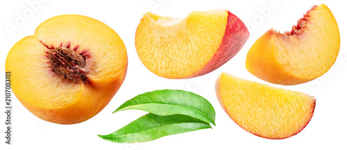 Set of ripe peaches slices and peach leaves on white background. File contains clipping paths.