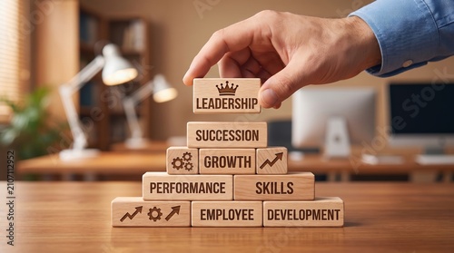 Human resources succession planning and leadership pipeline concept using stacked cube blocks in structured organizational hierarchy