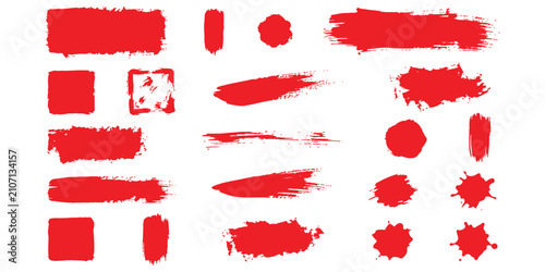 Obraz na plátně Set of various red paint brush strokes and ink splatters for creative graphic de