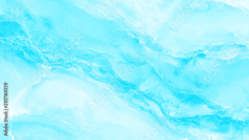 Fotografie Soft blue marble texture with white veins and subtle sparkle for backgrounds or