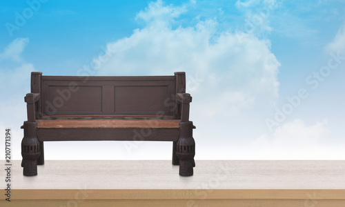 front view old brown wooden chair on wooden floor , blue and white sky background, isolated, object, decor, nature, vintage, retro, copy space