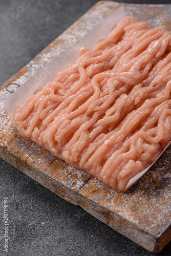 Canvastavla Fresh raw ground chicken, poultry meat for home cooking