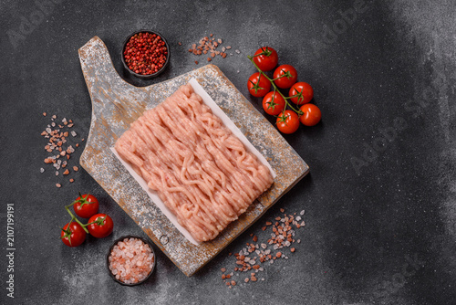 Fresh raw ground chicken, poultry meat for home cooking. Ground chicken