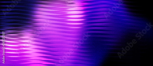 Foto Abstract purple light ripples reflecting on dark water