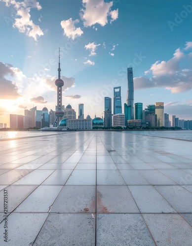 Modern city skyline over calm water at dusk.