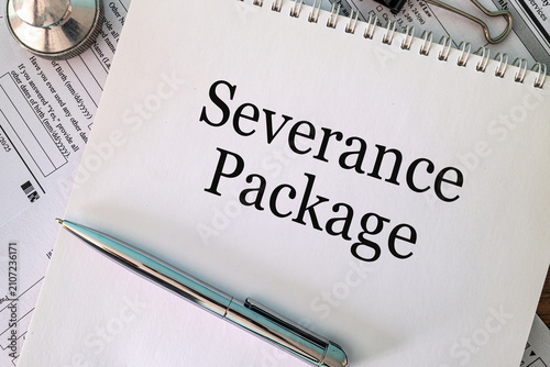 Severance Package text on notebook with pen and paperclips on white background, employment law and HR concept