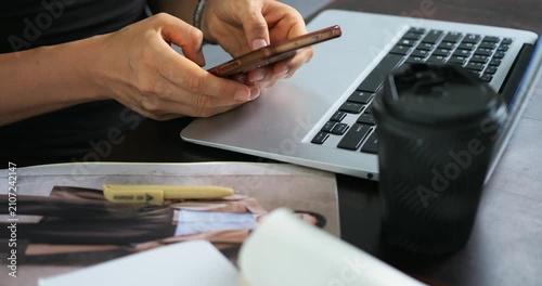 People scroll messages. Users leisurely browse through messages in calm coffee shop setting. People casually interacting with digital content while sitting comfortably in cozy coffee environment