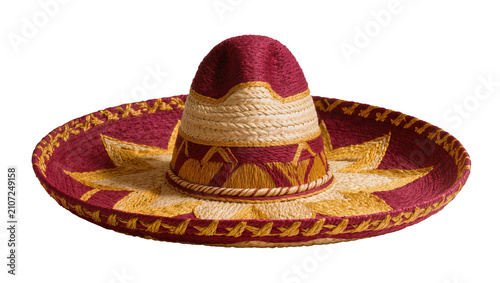 Obraz na płótnie Isolated traditional Mexican sombrero with vibrant red and golden intricate woven patterns