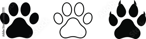 Fotografie Set of three distinct animal paw prints including solid and outline styles for w