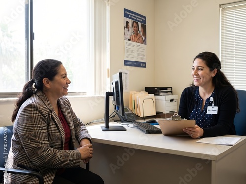 Hispanic Woman Checking In with Clinical Trial Researcher