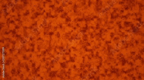 Abstract orange and red textured surface with organic grain patterns suitable for a looping background.