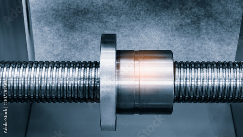 Canvas Print Close up of industrial metal screw shaft as part of screw transmission
