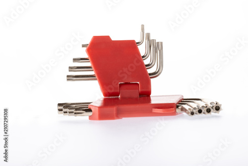 Quadro su tela Set of hexagonal wrenches in a red box for work isolated on white background