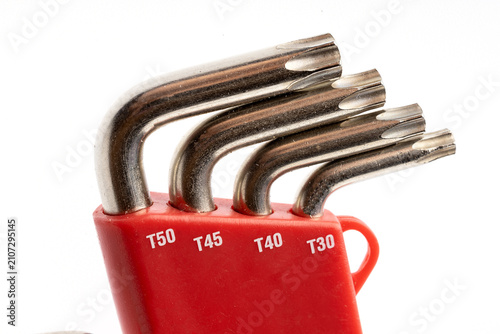 Quadro su tela Set of hexagonal wrenches in a red box for work isolated on white background