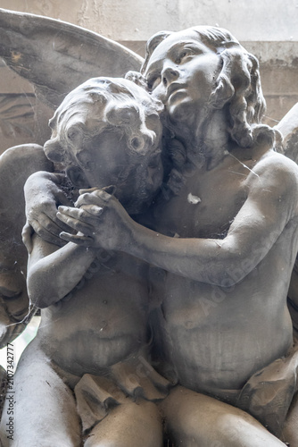 Marble Sculpture of Angel Embracing a Child