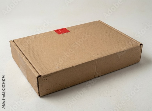 Closed brown cardboard shipping box