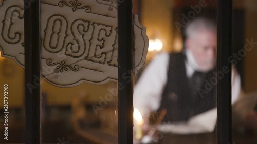 Saloon Closed focus on sign