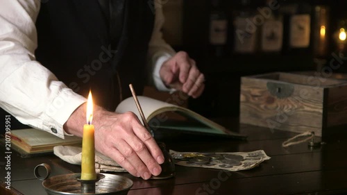 1800s man documenting earning focus on inkwell