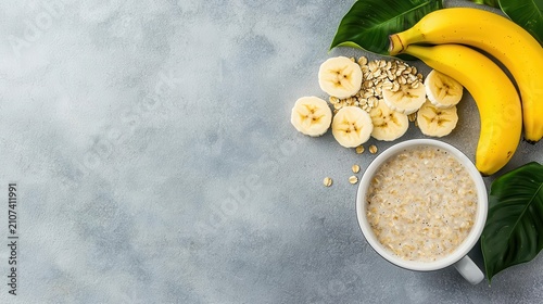 Flat lay of healthy breakfast routine with overnight oats, bananas, and coffee