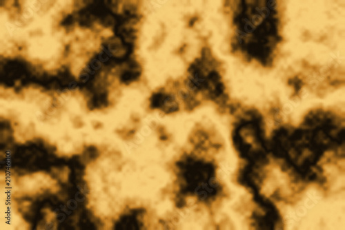 gold and amber organic marble cloud texture abstract surface background with flowing pattern
