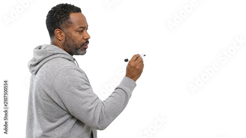 Focused Mature African American Man Writing with Marker Pen on Invisible Board Isolated on Transparent Background
