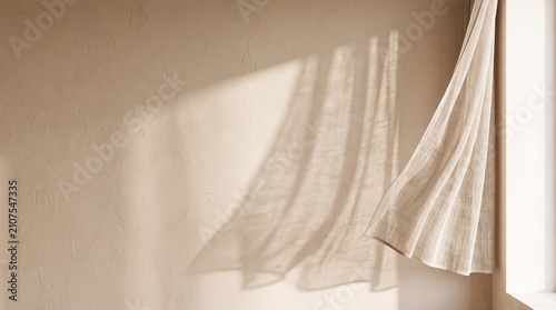 Minimalist beige textured wall with sunlight shadow and linen curtain blowing in wind for aesthetic interior background design