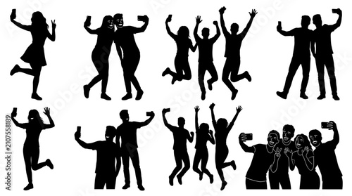 Obraz na plátne Diverse group of people capturing joyful selfies with smartphones, celebrating t
