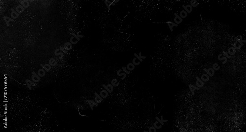 Dark grunge texture with white dust and scratches