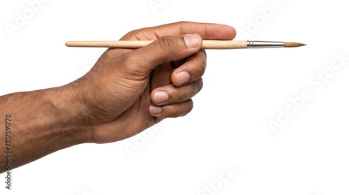 Bild auf Leinwand Paintbrush rests in a male hand as an isolated PNG artist tool with brown bristl
