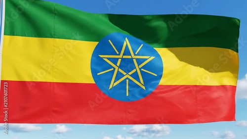 Patriotic Ethiopian Flag Fluttering in Wind Under Sunny Sky